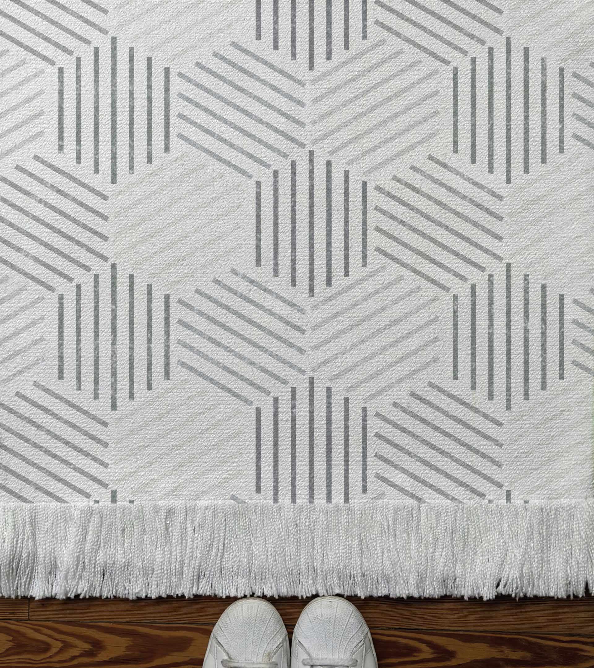 Alfombra tejida diseño geometrico con hexágonos en gris claro y gris oscuro